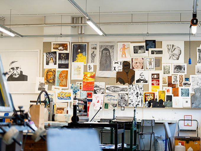 studio space with graphic design work on wall