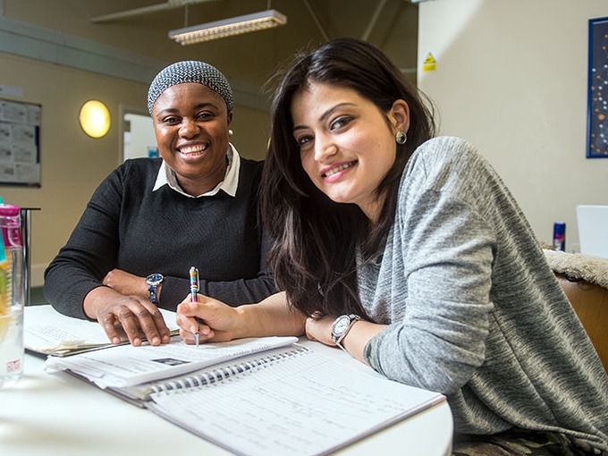 Two Students Smiling