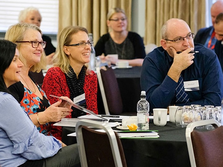a group of people smiling