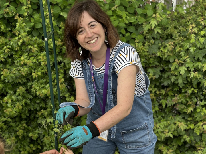 Image of Katrina Peters gardening with pupils
