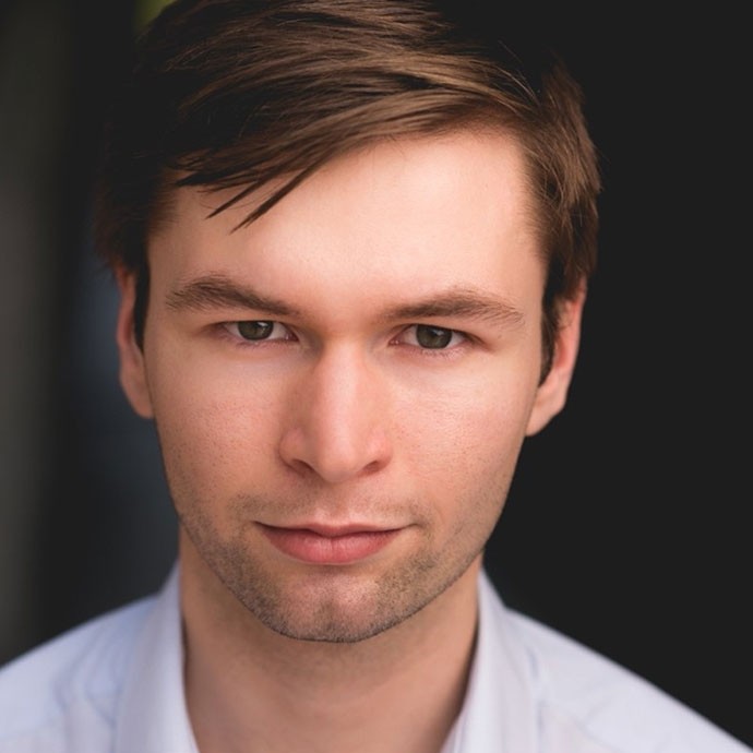 male staff smiling portrait 