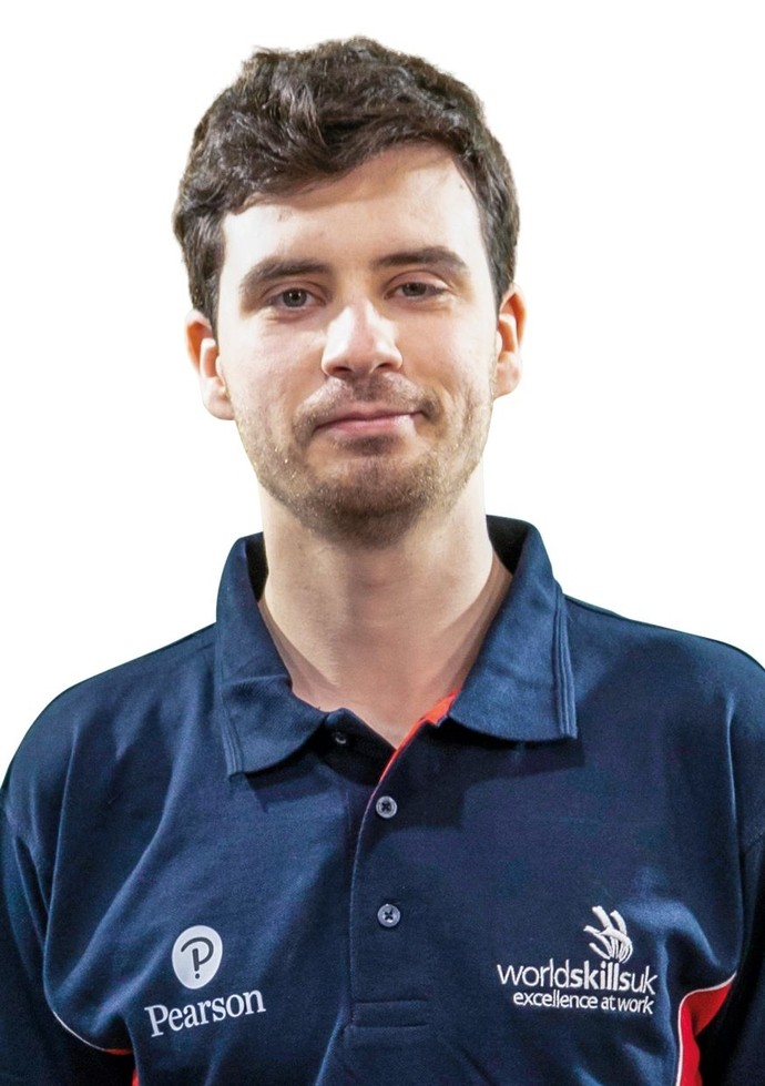Oscar is pictured wearing a navy blue WorldSkills top in front of a white background