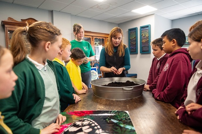 Sarah jones from NBGW hosting a session with children on butterfly species