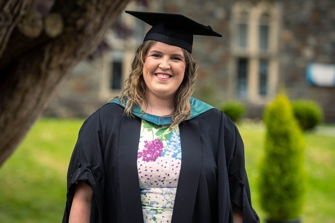 A photo of Lisa in her cap and gown