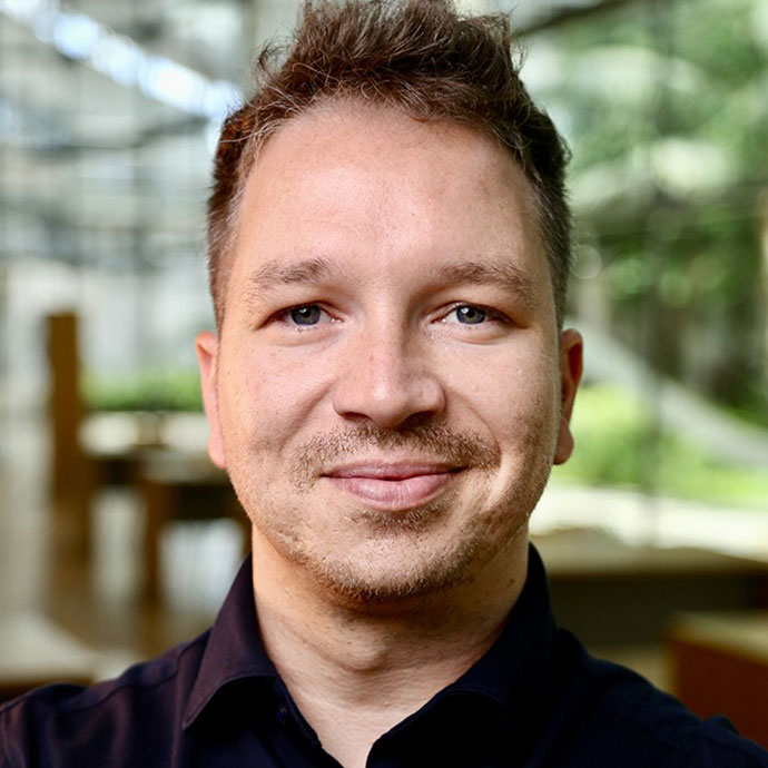 male staff profile smiling