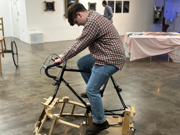 Luke Cotter riding a bike like piece of work created by himself