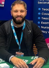 an image of Sam Jones in a recruitment fair