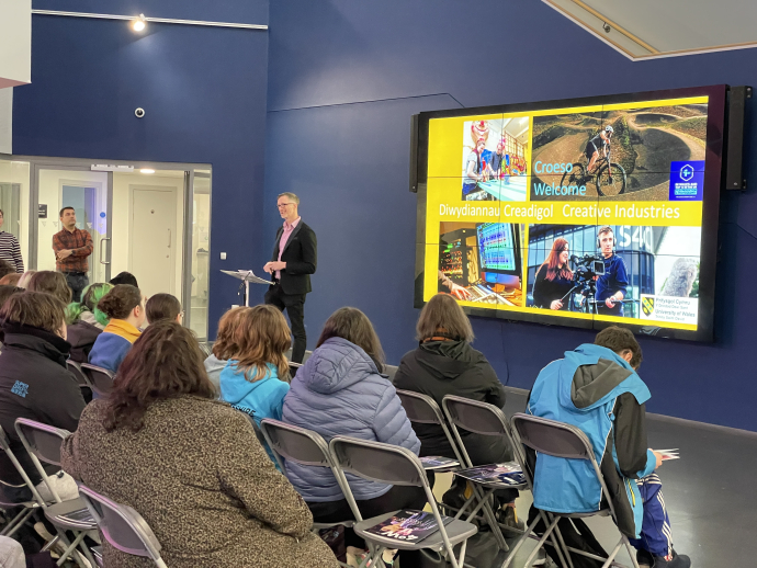 A group of students being presented by Jonathan Pugh, a lecturer from UWTSD