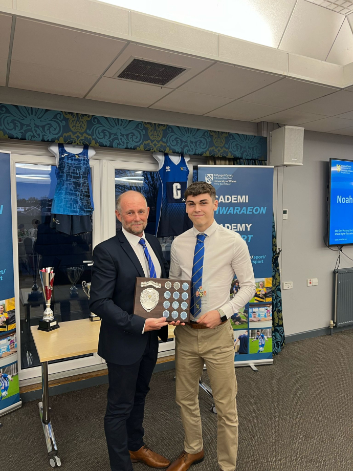 image of Noah Potter receiving his award