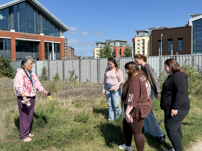 Glenda Tinney and students in an outdoor workshop