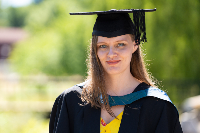 an image of Aria Anderson in her cap and gown