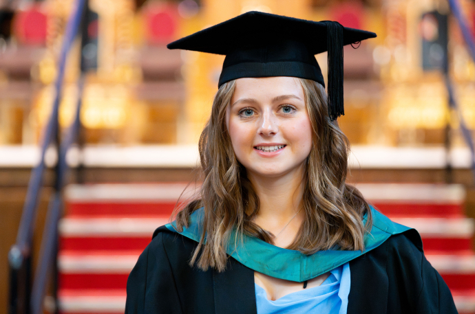 an image of Bethan Ball in her cap and gown