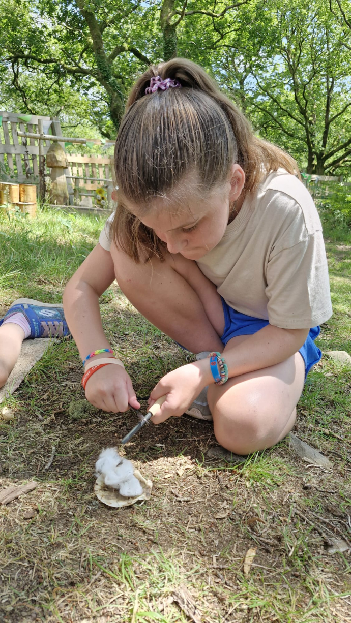 Child lighting a fire