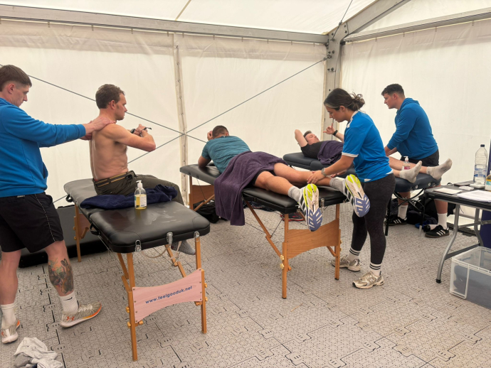 Sports Therapy students practicing on clients at Ironman 