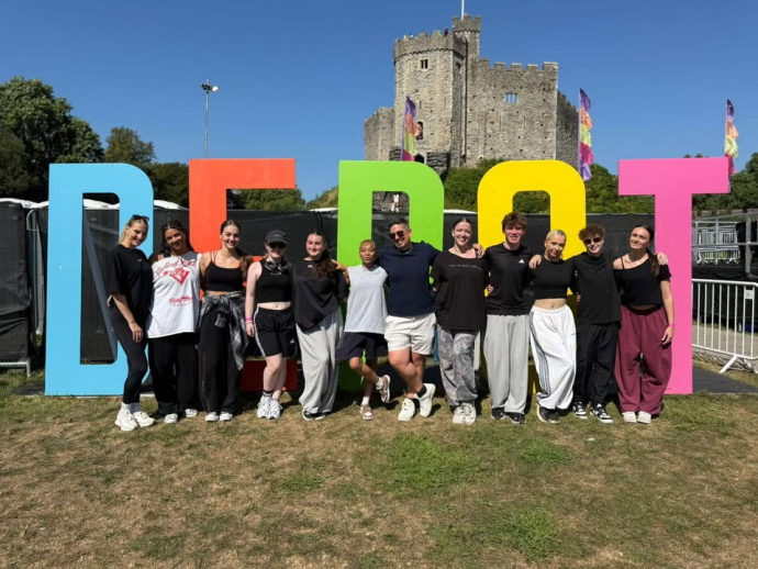 Wavda students standing in front of Cardiff Castle for Will Smith's Gig