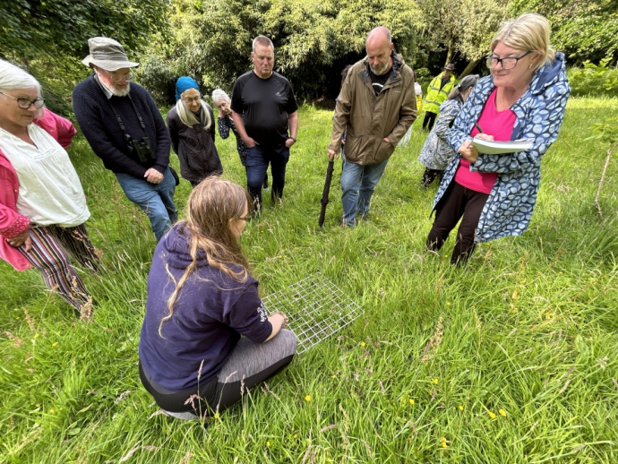 image of people in field 