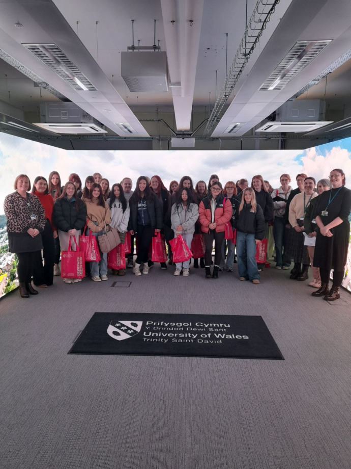 Coleg Ceredigion Trip to UWTSD group shot in the immersive room 
