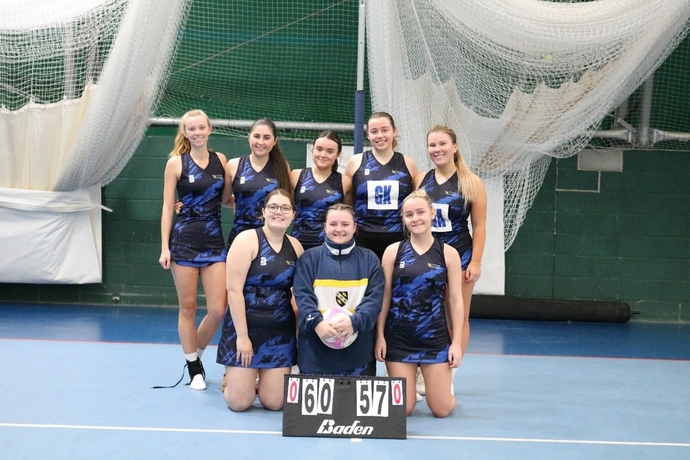 UWTSD netball team line up in sports hall