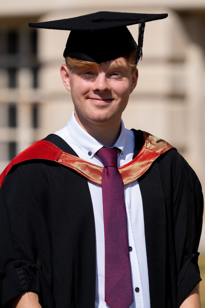 Aron Evans in his cap and gown 