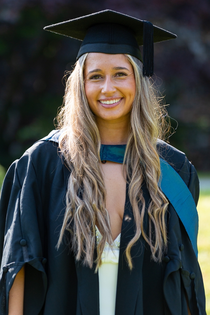 Image of Pheobe in cap and gown 
