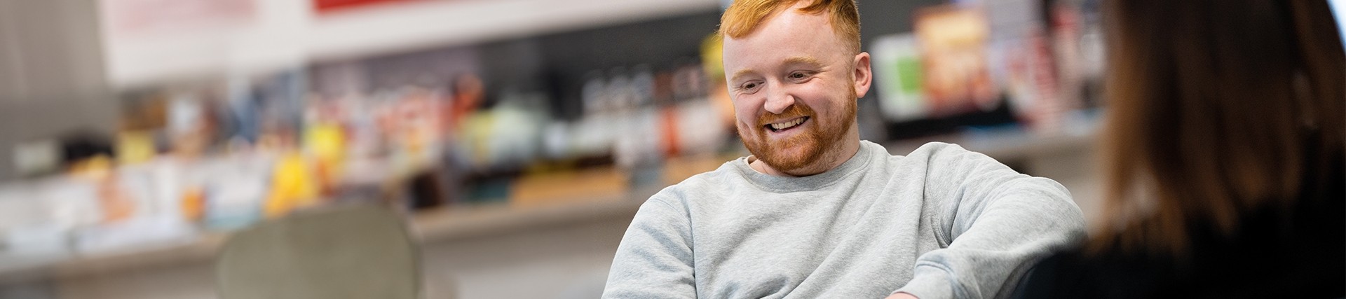 Student sitting relaxed smiling