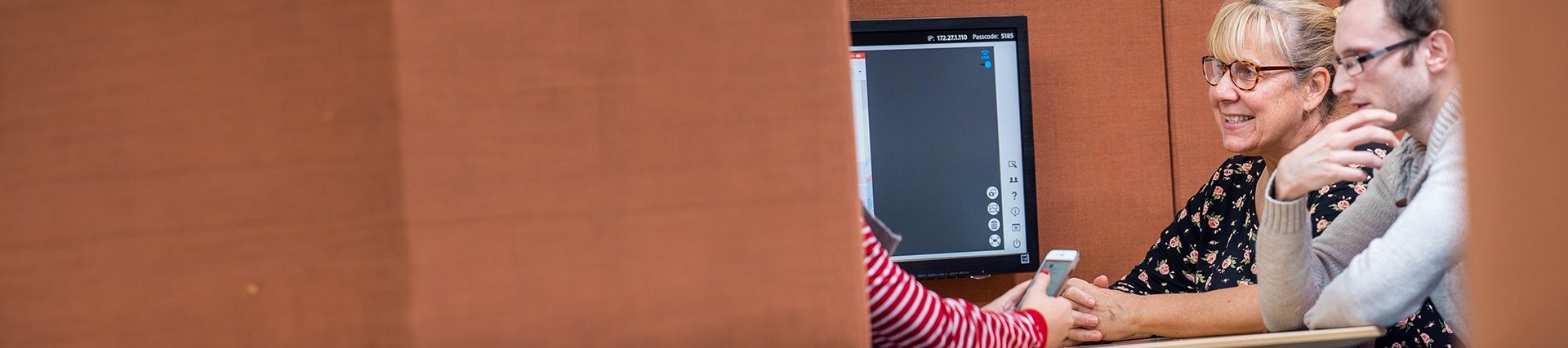 Staff and students working in a Pod