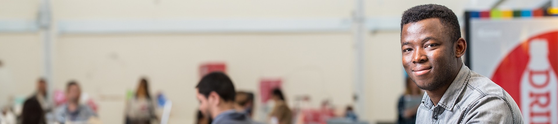 Student sitting down and facing sideways