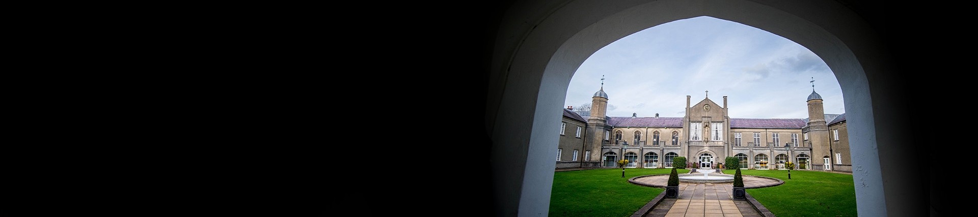 View of the Lampeter old building through an archway