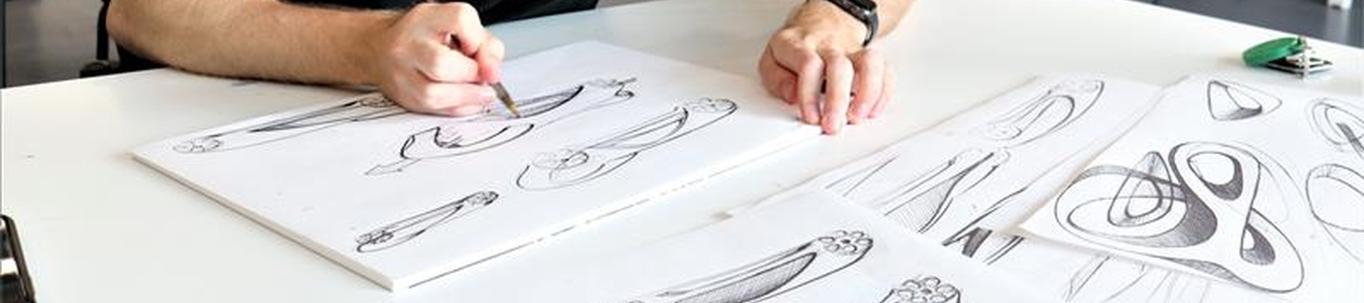 Automotive student sketching ideas