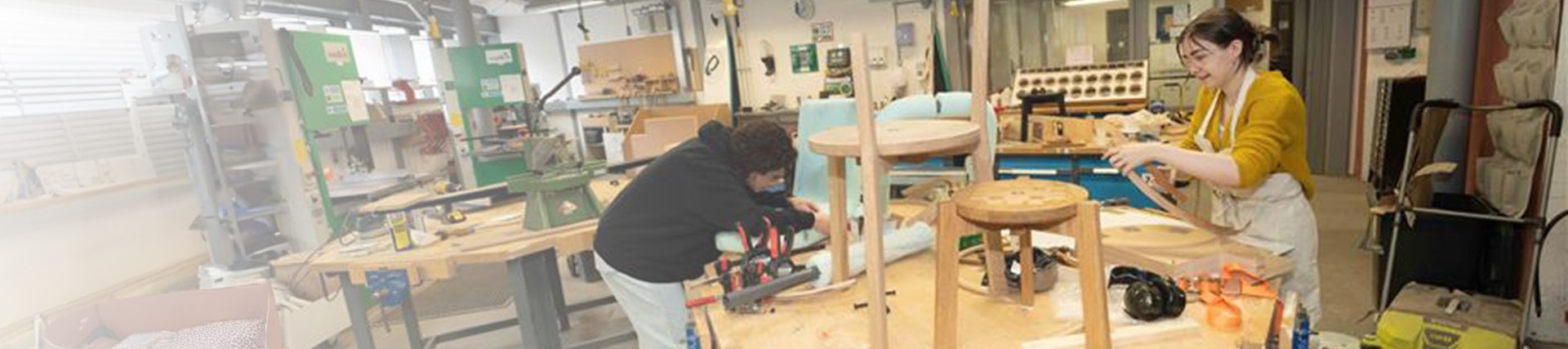 Students working in a furniture workshop