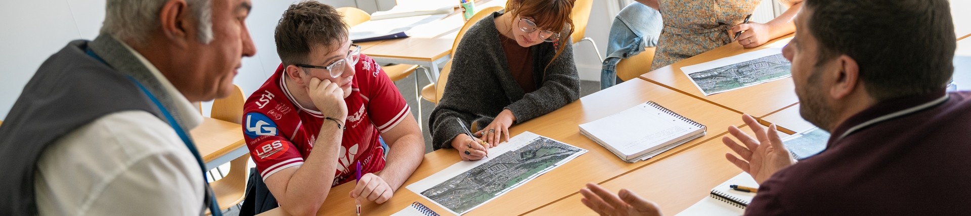 Image of students working on class project