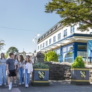 students walking through carmarthen town 