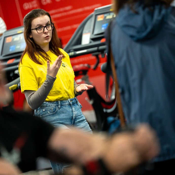 Student Ambassador giving tour of gym in Carmarthen
