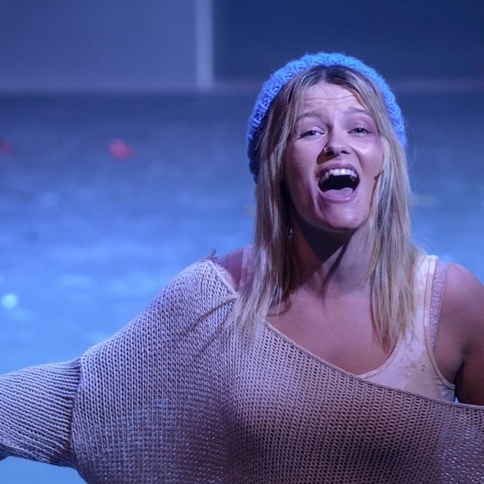 Student performing on stage