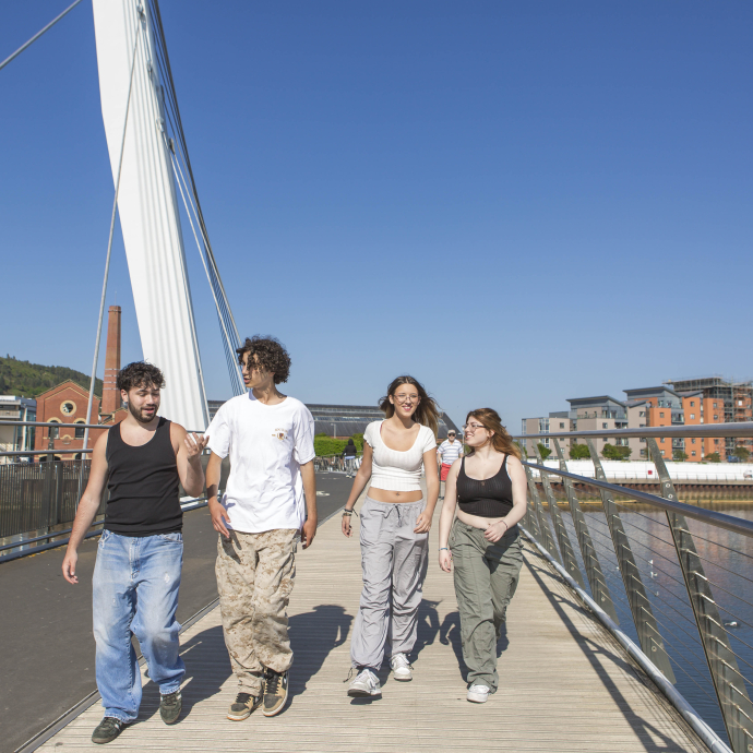 Students on the sail bridge at the Swansea SA1 campus - image 2