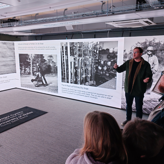 Daniel Phillips, Adventure Filmmaking student showcasing his accessibility in adventure presentation in the immersive rooms 