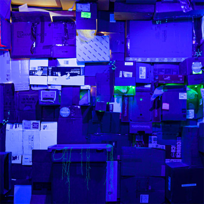 Blue room with lots of boxes