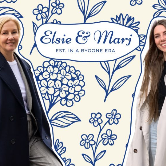 Two smiling women standing against a blue and white patterned background with the logo Elsie and Marj between them.