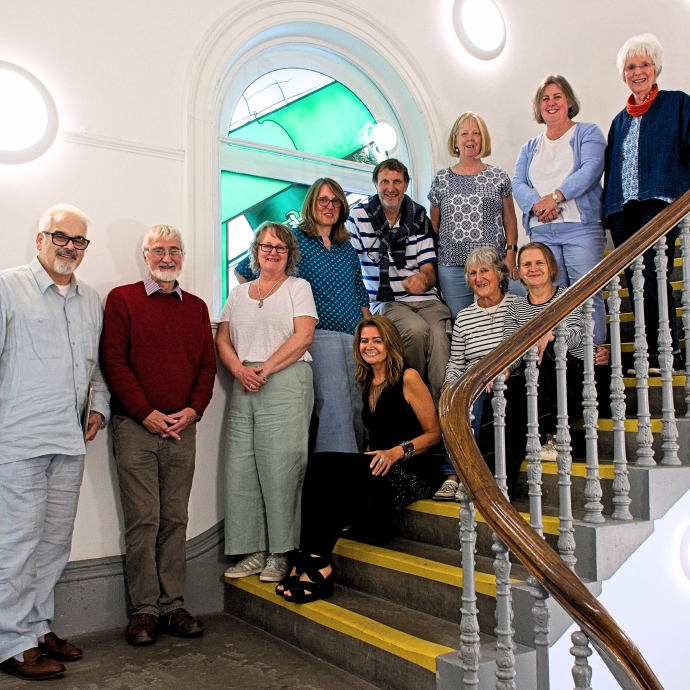 Group of people standing on staircase