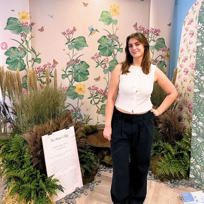 Anna Eynon with her textile display behind her