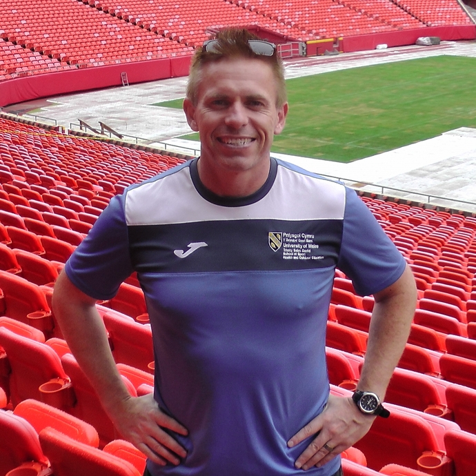 Andrew Thomas at a sports stadium