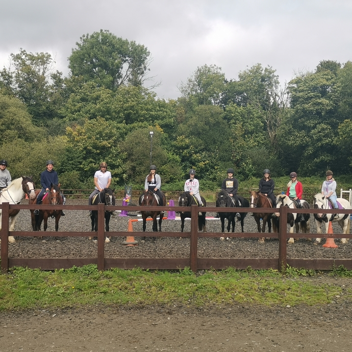 an image of a group of people riding horses
