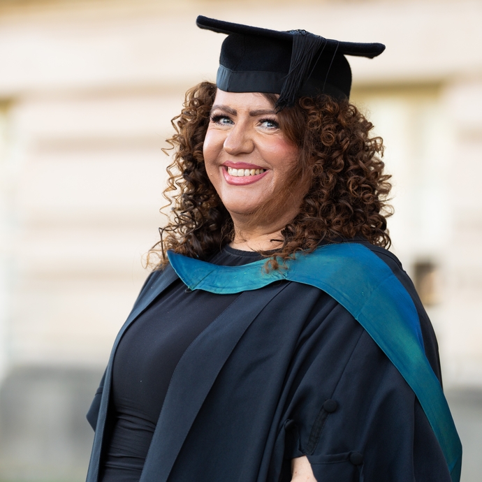 Joanne Wozencroft smiling at her graduation 