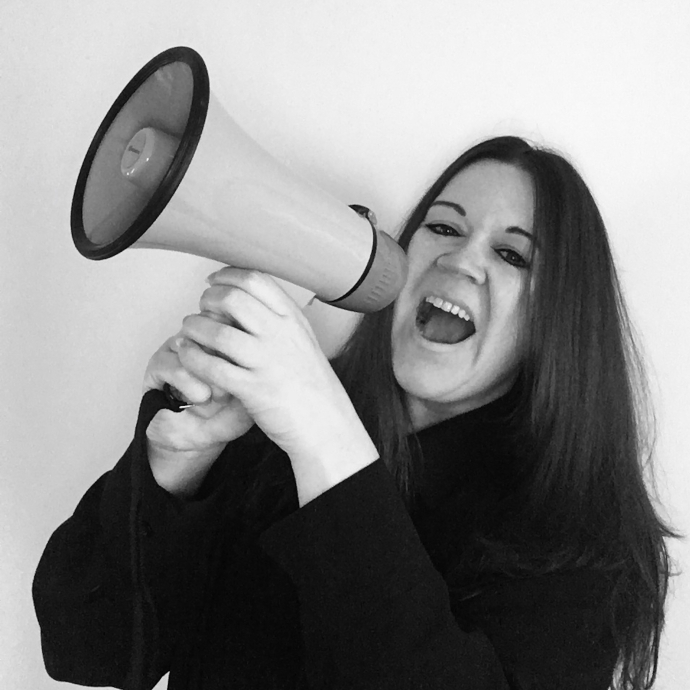 Marilyn Allen headshot with Megaphone