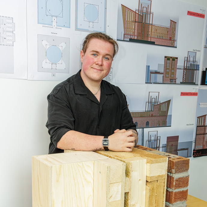 Dylan Longman with his work