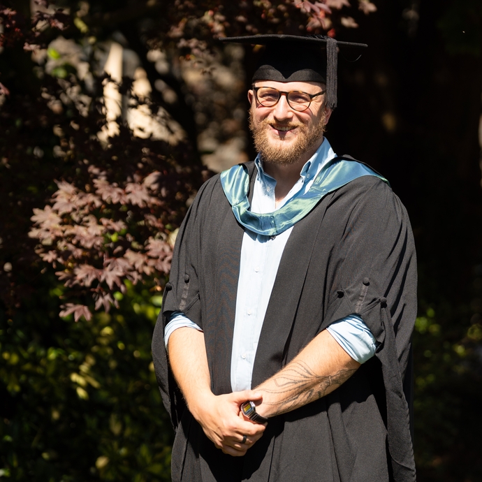an image of Dan in his cap and gown 
